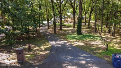 Nestled on a stunning 3.7-acre treed lot complete with a private - photo 5