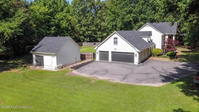 Nestled on a stunning 3.7-acre treed lot complete with a private - photo 6