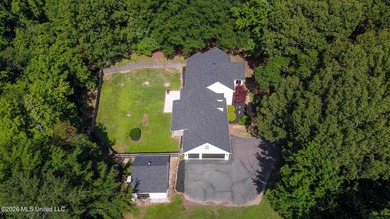 Nestled on a stunning 3.7-acre treed lot complete with a private - photo 7