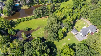 Nestled on a stunning 3.7-acre treed lot complete with a private - photo 8