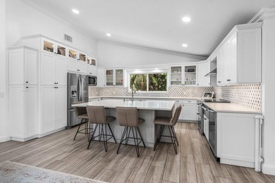Stunning, fully renovated 4 BD, 2.5 BA residence situated on an - photo 8