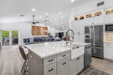 Stunning, fully renovated 4 BD, 2.5 BA residence situated on an - photo 9