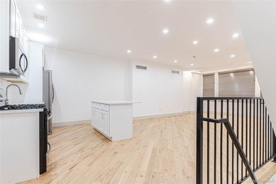 This lovely 2-family home was gut renovated in 2020 and includes - photo 8
