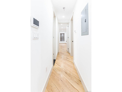 This lovely 2-family home was gut renovated in 2020 and includes - photo 9