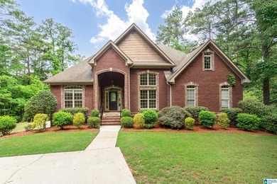 Private lake living at its finest! Tucked away on a wooded lot - photo 1