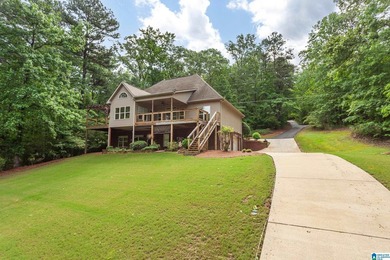 Private lake living at its finest! Tucked away on a wooded lot - photo 4