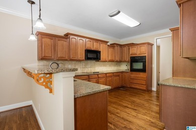 Private lake living at its finest! Tucked away on a wooded lot - photo 10