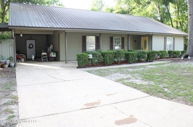 This home features an open floor plan, lots of shade from the - photo 2