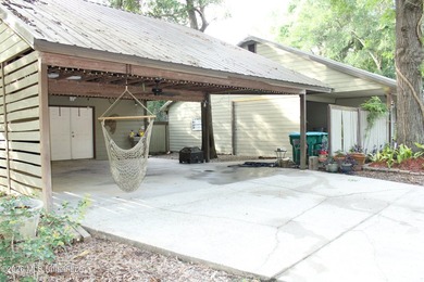 This home features an open floor plan, lots of shade from the - photo 5