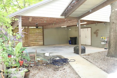 This home features an open floor plan, lots of shade from the - photo 6