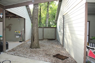 This home features an open floor plan, lots of shade from the - photo 7