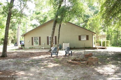 This home features an open floor plan, lots of shade from the - photo 9