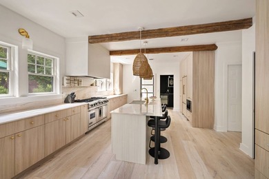 Completely renovated and beautifully finished, this - photo 12