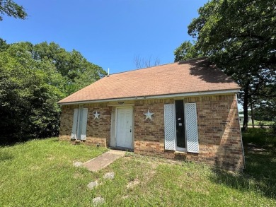Lake Home For Sale in Enchanted Oaks, Texas