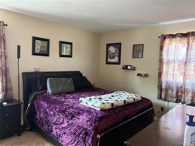 Bright & cheery 5 bedroom, 2 1/2 bath Hi-ranch tucked away in - photo 18
