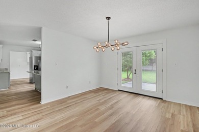 Recently renovated and move-in ready, this spacious 4-bedroom, 2 - photo 6