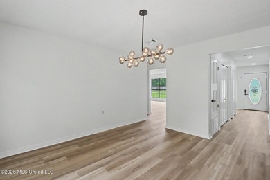 Recently renovated and move-in ready, this spacious 4-bedroom, 2 - photo 7