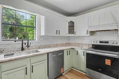Recently renovated and move-in ready, this spacious 4-bedroom, 2 - photo 9