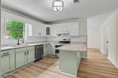 Recently renovated and move-in ready, this spacious 4-bedroom, 2 - photo 10
