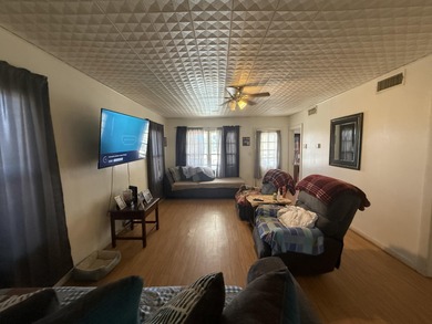 Charming and inviting, this delightful 2-bedroom, 1-bathroom