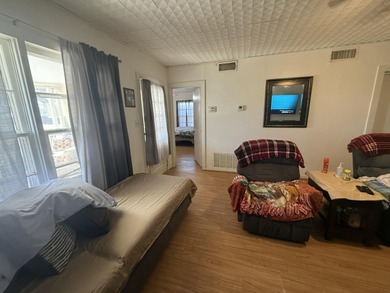 Charming and inviting, this delightful 2-bedroom, 1-bathroom