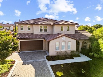 EXCLUSIVE HILLTOP VIEW HOME | Perched on a corner lot along a - photo 1