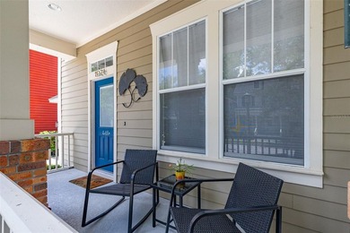 Located in Celebration, this 3-bedroom, 2.5-bathroom home backs - photo 6