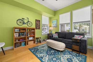 Located in Celebration, this 3-bedroom, 2.5-bathroom home backs - photo 10