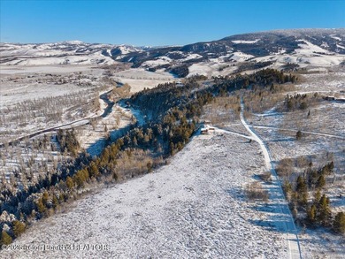 Sitting above the valley floor, this Kelly Highlands property - photo 4