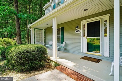 Tucked away on a quiet, wooded homesite, this beautiful 4BR/3 - photo 5