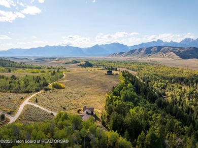 Sitting above the valley floor, this Kelly Highlands property - photo 9