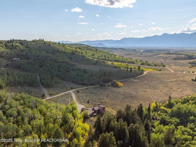 Sitting above the valley floor, this Kelly Highlands property - photo 10