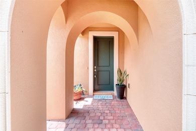 Mature landscaping greets you as you enter the Arched Covered - photo 3