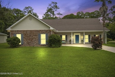 Welcome home to this charming 3-bedroom, 2-bath residence in the - photo 1
