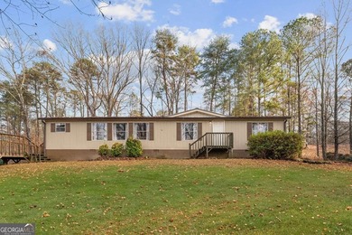 (private lake, pond, creek) Home For Sale in Canton Georgia