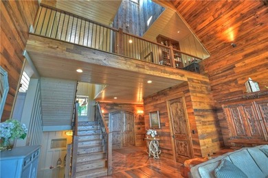 THIS ONE OF A KIND RUSTIC home on private 2.14 acre lot in the