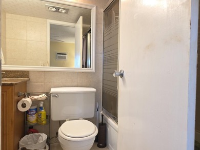 Well-maintained 1-bedroom, 1.5-bath residence featuring granite - photo 23