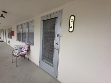 Well-maintained 1-bedroom, 1.5-bath residence featuring granite - photo 32