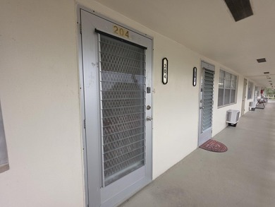 Well-maintained 1-bedroom, 1.5-bath residence featuring granite - photo 34