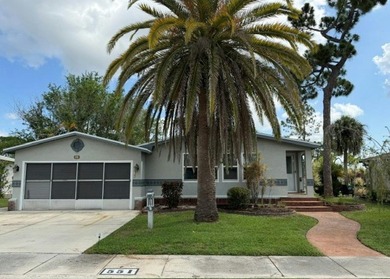 Bright, spacious TURN KEY, stucco home with a versatile layout & - photo 1