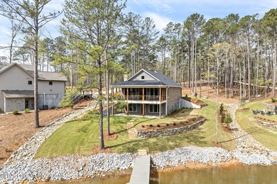 Positioned within White Oak Landing, this 5 bedroom, 3 bath lake - photo 2
