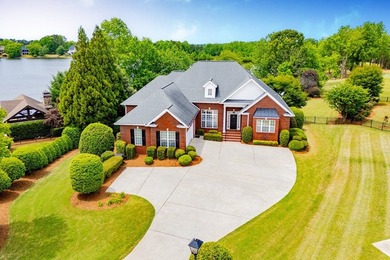 Coming soon! Lakeside Luxury! This stunning 4-sided brick ranch - photo 2
