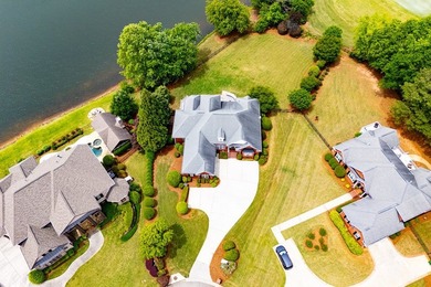 Coming soon! Lakeside Luxury! This stunning 4-sided brick ranch - photo 6