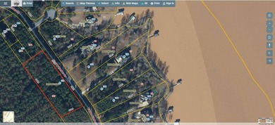 This beautiful Gated 1.79-acre lot in Eagles Harbor offers an - photo 2