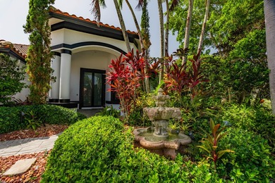 Welcome to this fully renovated lakefront home tucked away on a - photo 1