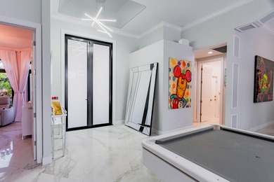 Welcome to this fully renovated lakefront home tucked away on a - photo 7