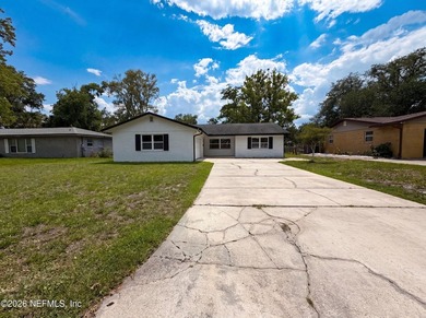 Discover 7842 Rondeau Dr E, recently updated with all stainless - photo 1