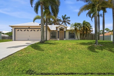 This charming single-story home in the heart of Port St. Lucie - photo 1
