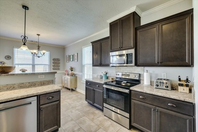 Welcome home to this inviting and well-maintained 4-bedroom, 2