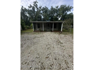 Conveniently located in the heart of Palatka, this charming - photo 3